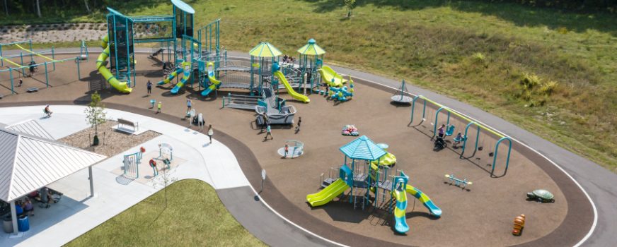 Playground at Woodhaven Park in MN with safety surfacing